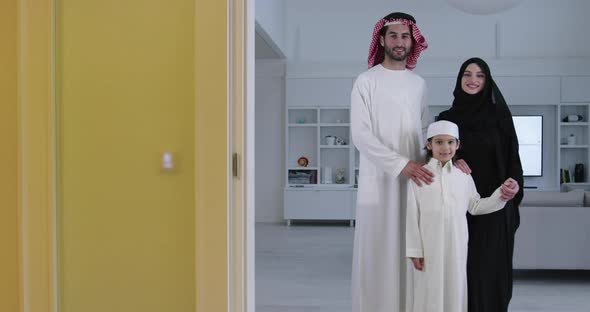 Muslim Family with Kid in Modern Home
