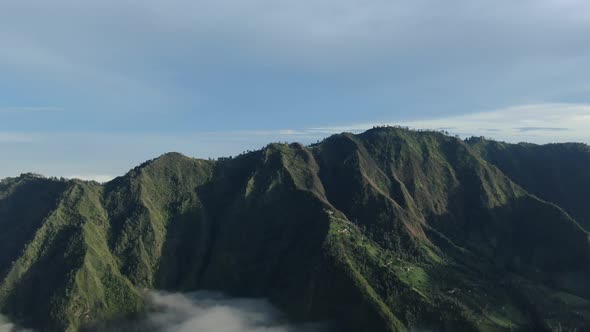 Aerial view of green mountain range 