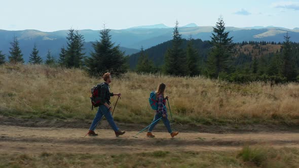 Tourists Walking Hills Path Exploring Nature National Park Sunny Warm Day