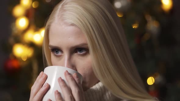 Beautiful Romantic Girl with Cup of Coffee or Tea