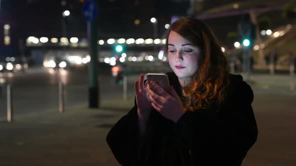 Portrait of young beautiful caucasian long brown hair woman using smart phone