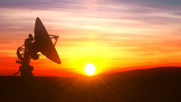 Radio Telescope Explores Evening Sky Against Scenic Sunset