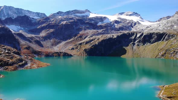 Beautiful Color Of Weisssee In High Tauern National Park In Salzburg, Austria. aerial, pullback