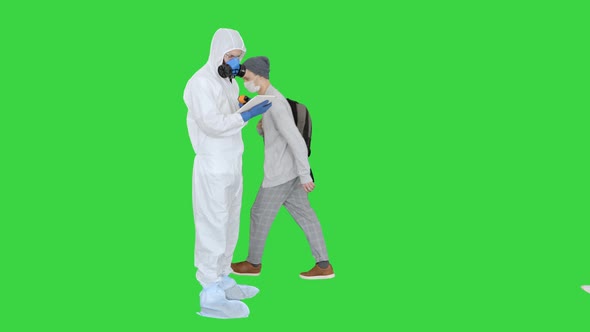 Screening People for Virus Symptoms Temperature Checkpoint on a Green Screen, Chroma Key