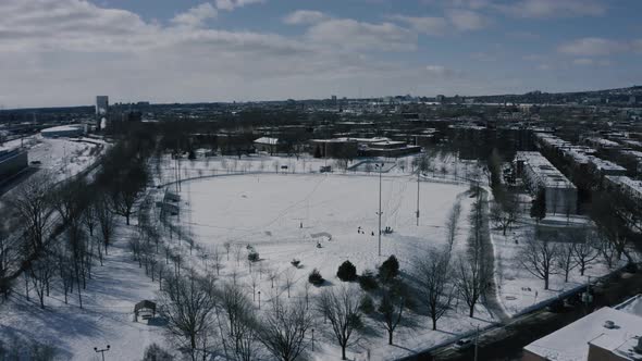 4K winter sleighride sliding hills - drone - fast - towards park