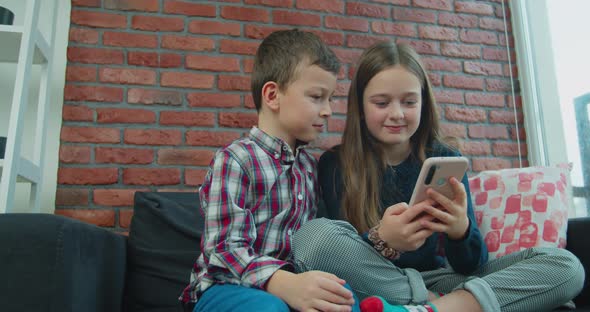 Children Watching Smart Phone Happy Young Kid Using Smartphones Together Smiling