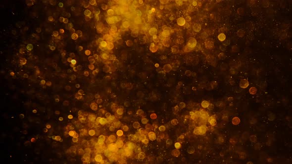 Gold Dust on Black Background Blur