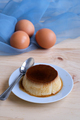 Homemade egg custard on wooden table - PhotoDune Item for Sale