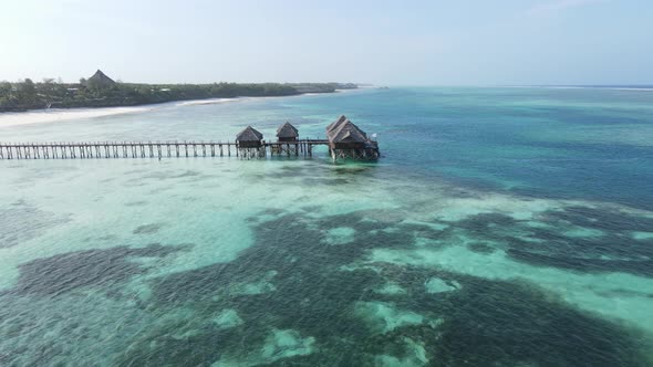 Aerial View of a House on Stilts in the Ocean on the Coast of Zanzibar Tanzania Slow Motion