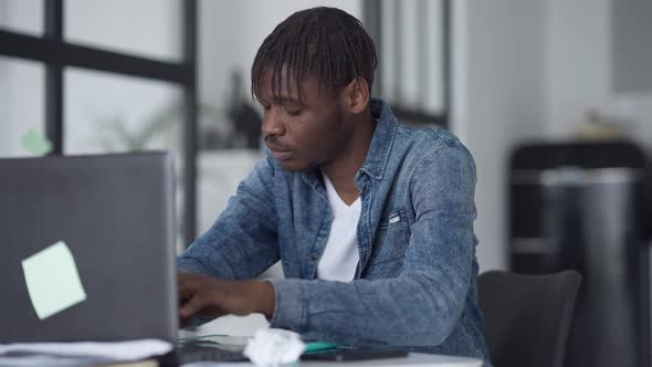 Middle Shot Portrait of Busy Man Planning Business Startup Idea Sitting in Home Office