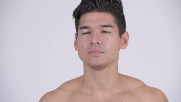 Face of Young Handsome Muscular Shirtless Man Thinking