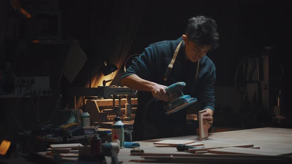 Young Man Works in a Carpentry Shop