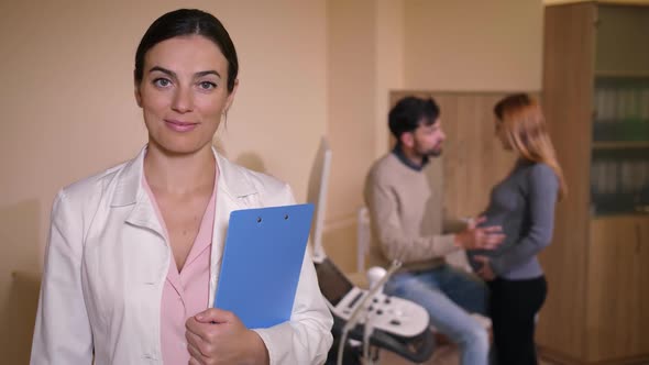 Portrait of Smiling Confident Female Obstetrician