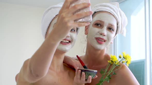 Beautiful Woman Having a Facial Treatment at Spa