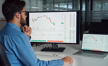 Business man trader crypto investor analyzing stock market using computer.