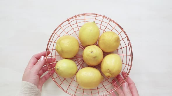 Organic lemons in the wire basket.