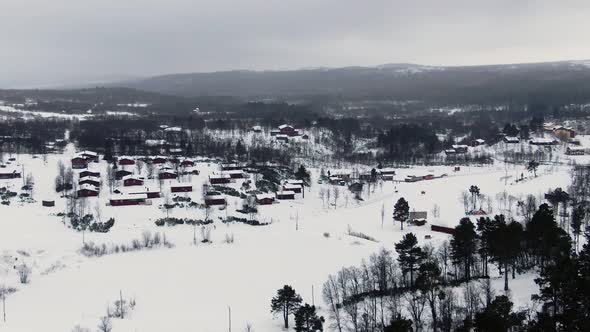 Soft wide aerial view of snowy wintery climate and beautiful scenery
