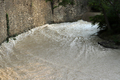water flowing rapidly after the dam gate is opened - PhotoDune Item for Sale