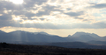Light beam, image of silhouette mountains and cloudy sky - PhotoDune Item for Sale
