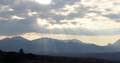 Light beam, image of silhouette mountains and cloudy sky  - PhotoDune Item for Sale