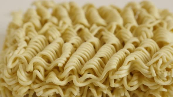 Surface of Chinese type  noodles close-up 4K 2160p 30fps UltraHD tilting  footage - Instant food blo