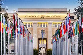 d Nations Office at Geneva with the flags of the member countries.