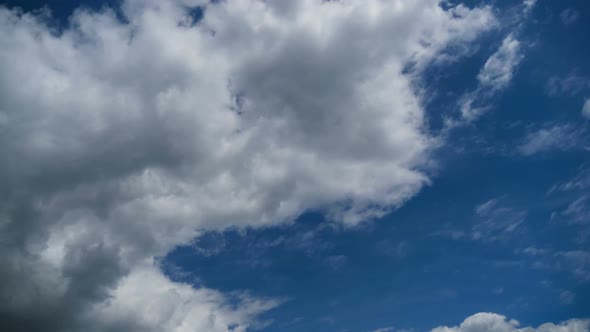 Clouds Move Smoothly in the Blue Sky. Timelapse