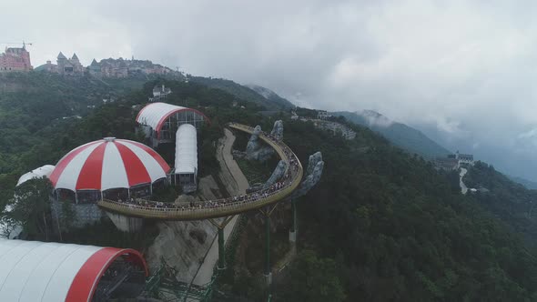 Aerial view of Golden bridge in Ba Na Hills, Da Nang. Cable car