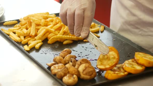 Chef Serves Food