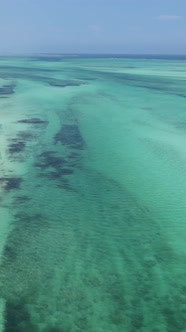 Tanzania  Vertical Video of the Ocean Near the Coast of Zanzibar Slow Motion