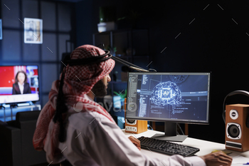 Arab Engineer Monitoring Ai on Screen