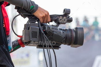 Close up Professional videographer on event, videographer filmmaker cinematographer camera.