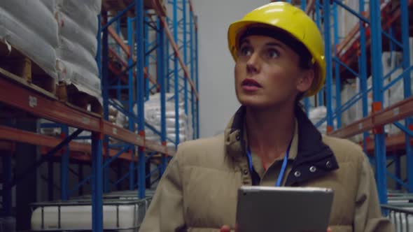 Young female worker in a warehouse