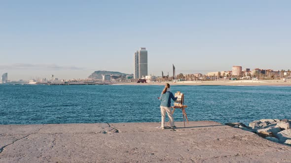 Focused Lady Artist Painting Sight of Splendid Barcelona City Harbor