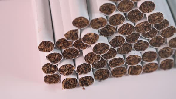 Close Shot of a Pile of Cigarettes Spinning