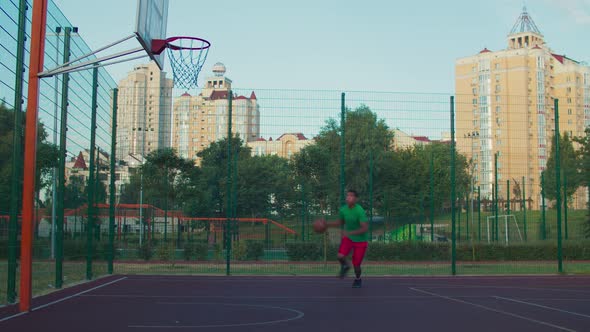 Athlete Doing Reverse Layup on Basketball Court