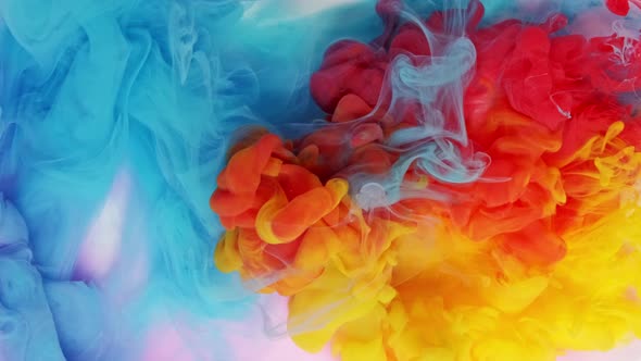 Ink in Water Exploding Mixing in Slow Motion, Paint Splash Swirling Underwater, Colorful Clouds