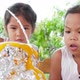 Two girls do volcano experiment at their house - VideoHive Item for Sale