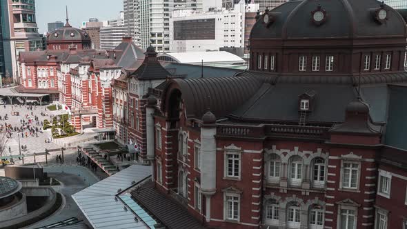 time lapse of Tokyo station, a railway station in the Marunouchi business district in Tokyo, Japan