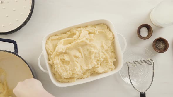 Step by step. Preparing classic mashed potatoes for Thanksgiving dinner.