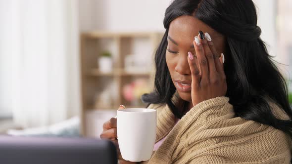 Sick Woman with Tea Having Video Call on Laptop