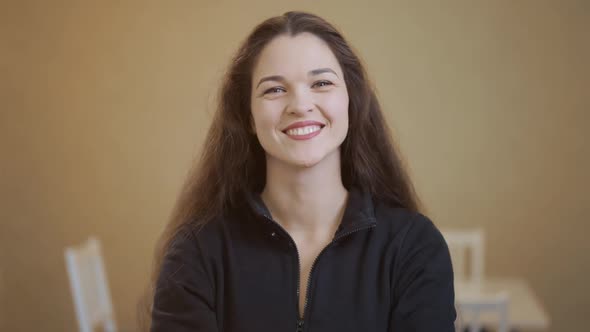 Portrait of an Attractive Young Woman Smiling