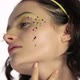 Young woman with star decorations on face - VideoHive Item for Sale