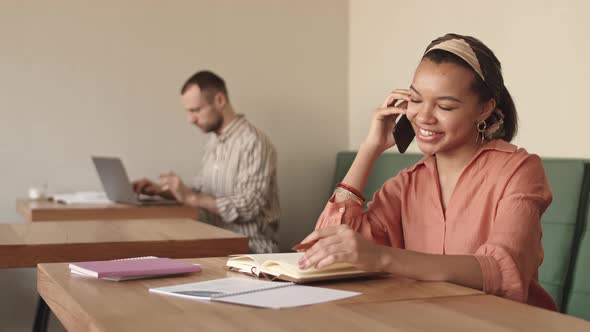 Businesspeople Working in Modern Coworking Space