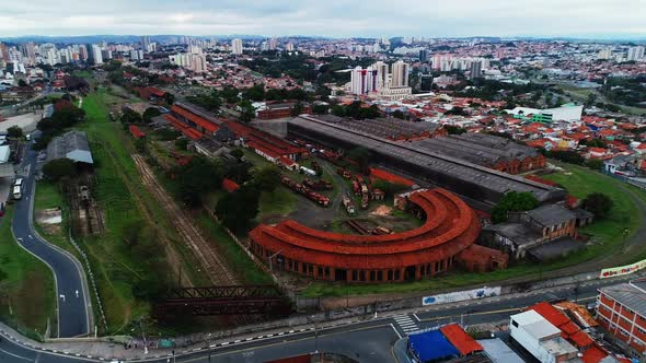 Aerial video of an old train station in the city of Campinas with abandoned wagons, Brazil.