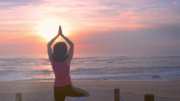 Woman Practicing Yoga on Beach Beautiful Summer Sunset