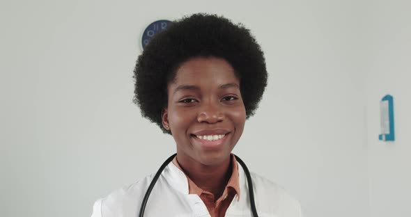 African American Female Doctor Wear White Medical Coat Stethoscope Look At
