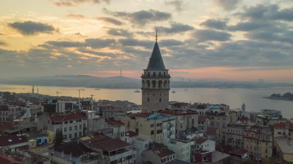 Galata Tower in Sunrise Sunlight, Aerial Hyperlapse Drone Time Lapse Circle Shot