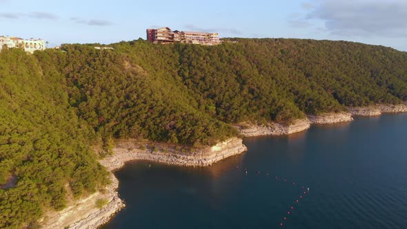 Aerial shot of a swimming hole right under the oasis on lake travis in Austin Texas. Shot on 9/10/20