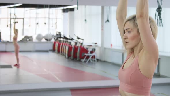 Young woman training in a sports club